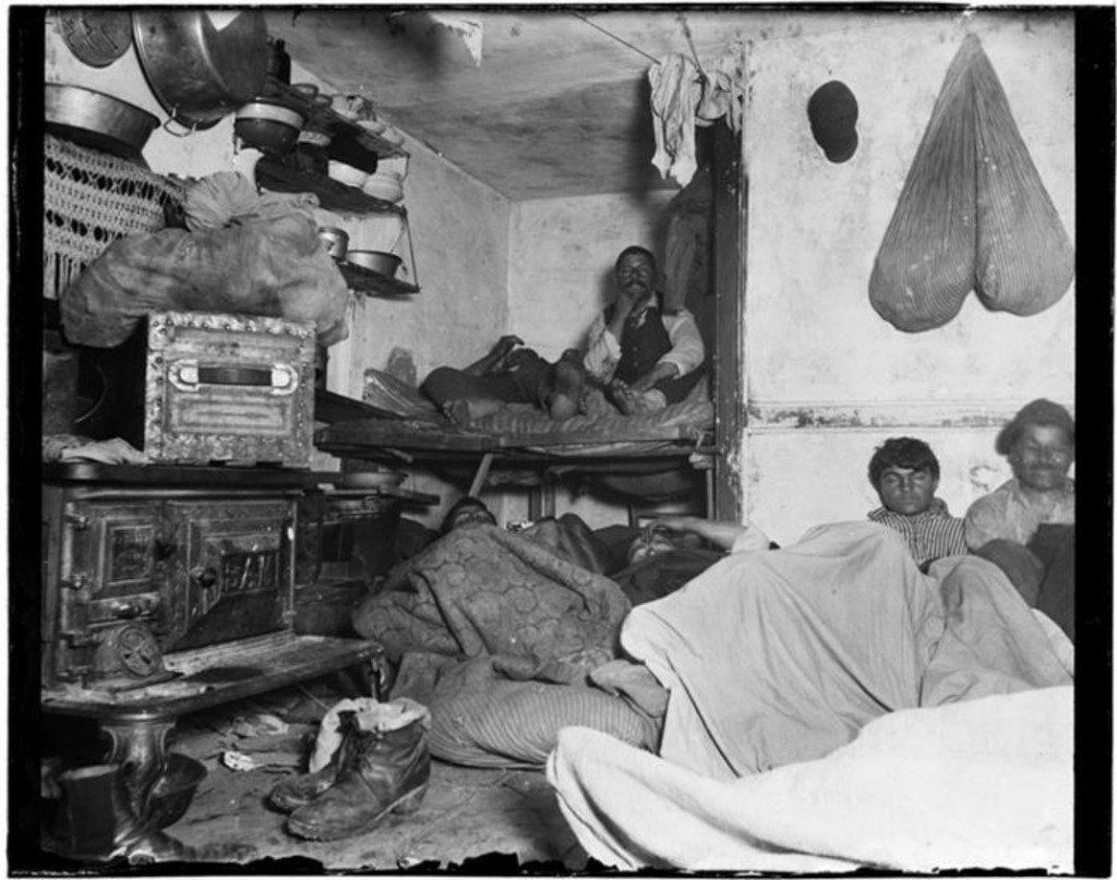 Lodgers in a crowded Bayard Street tenement, 1889. (Jacob A. Riis, Museum of the City of New York)