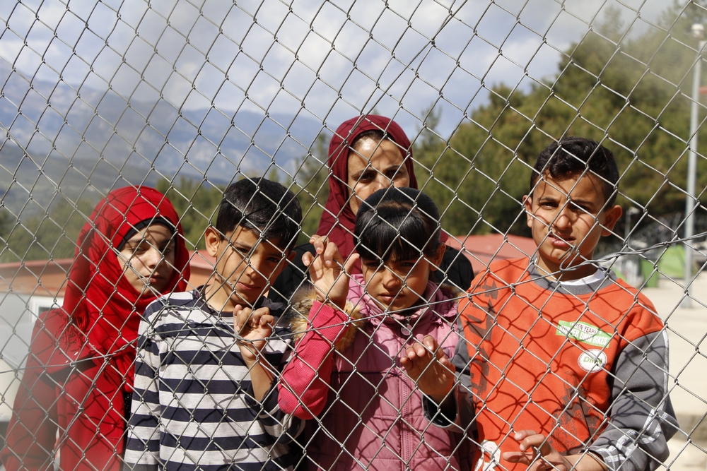 Khadija, 42, is a mother of four from Syria who is now detained on Samos island, Greece, along with her children. She spoke to MSF from behind two metal fences. What is going to happen next? Will they kill us here in Europe? My husband was killed and our house was destroyed by a barrel bomb in 2013. Since then we have been moving from village to village looking for safety, until I lost hope and I brought my children to Turkey. I worked many jobs but it was so hard for me to manage with four children so I decided to come here to be safe. Yet here we are behind barbed wire like criminals, this is extremely unjust. For more details see: https://lc.cx/4BCC