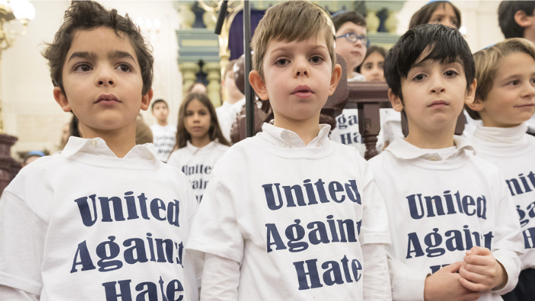 UN Photo/Rick Bajornas: 
Children wearing “United Against Hate” t-shirts appear at an interfaith gathering at the Park East Synagogue in New York City in memory of Jewish worshipers who were killed in Pittsburgh in the United States. (31 October 2018)